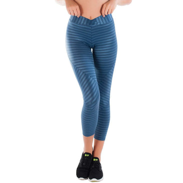 Calça Legging Poliamida Azul Cintilante | New V Calça Legging Feminina Blue New Vision (poliamida) com cós transpassado!Conta com tecido levemente brilhoso texturizado garantindo um lindo e único visual, seja na academia ou...