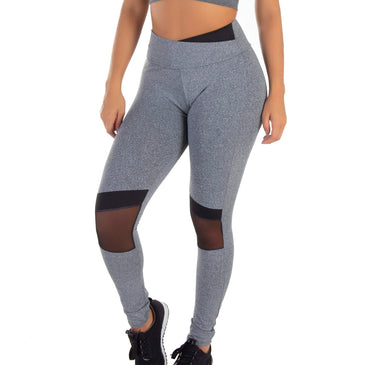 Legging Mescla Cós Transpassado e Telinha | Black Slash 2114 Calça Legging Cinza Mescla com telinha na altura dos joelhos e cós transpassado preto interno | Black SlashConta com cós transpassado baixo, agregando muito estilo...