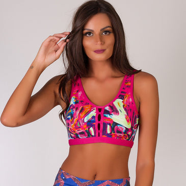 Top Mostra Decote com Abertura - Colorido | Sutiã Tropical *Top Fitness sem bojo*Modelagem reforçada*Com decote e pequena abertura no centro*Com elástico na base que fornece conforto e sustentação*Lindas EstampasA modelo Veste Tamanho M.     tamanhos Tamanho P...