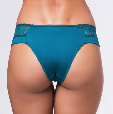 o produto Calcinha Sexy Com Transparencia>Confeccionada em Poliamida>Com Renda transparente na parte frontal>Renda no cós>Lacinho na lateral>Forro em AlgodãoTamanhos Aproximados M veste até o manequim 42G... 